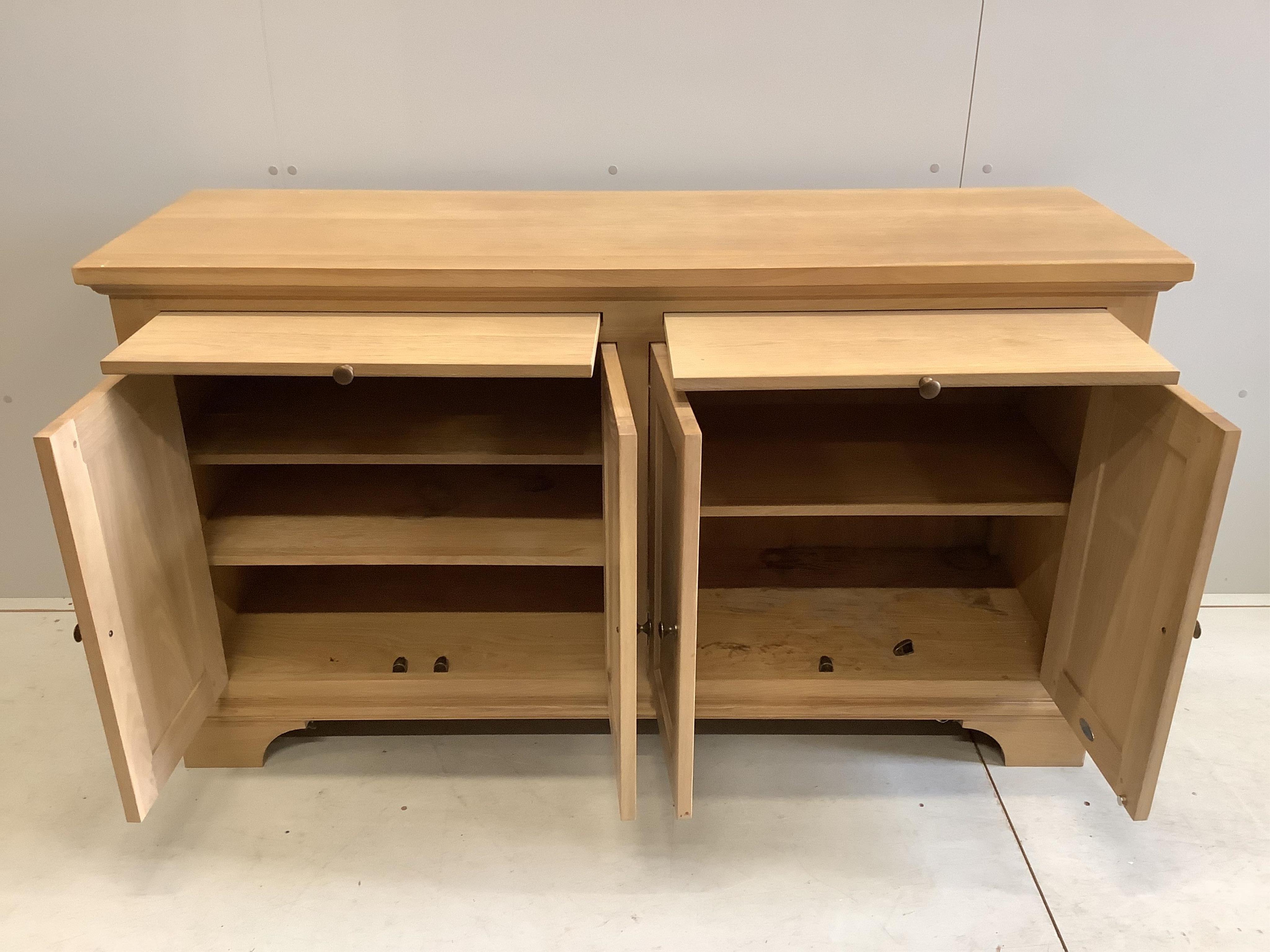 A modern Neptune oak sideboard, width 153cm, depth 49cm, height 87cm. Condition - fair to good